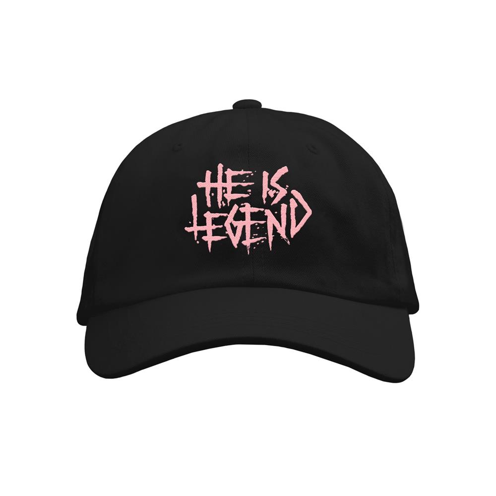Black Dad Hat. He Is Legend text embroidered in pink on the front. 